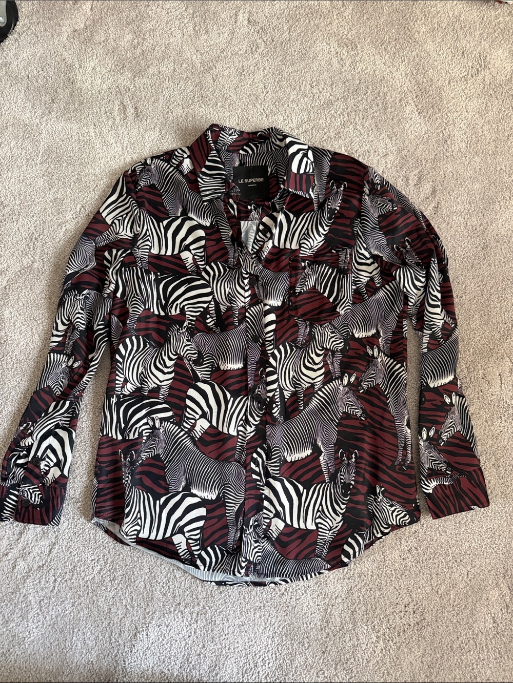 Le Superbe Women's Zebra Print Button-Up Blouse in Burgundy and Black